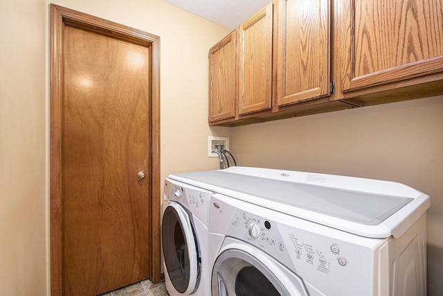 238 Baynton Ave NE, Grand Rapids, MI 49503 - laundry room with independent washer and dryer and cabinet space