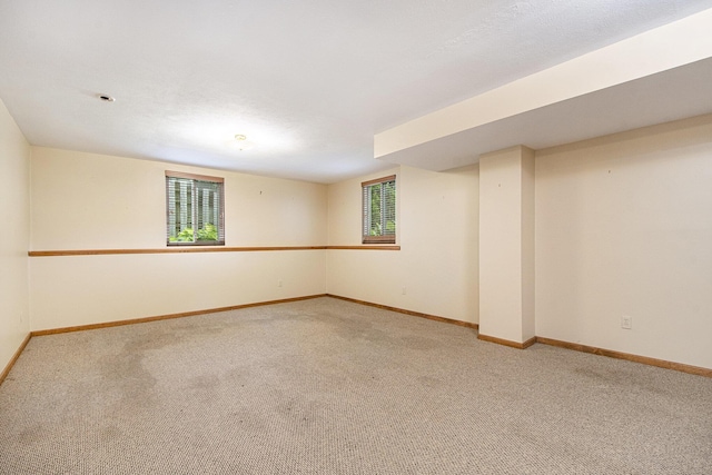 238 Baynton Ave NE, Grand Rapids, MI 49503 - carpeted empty room featuring baseboards