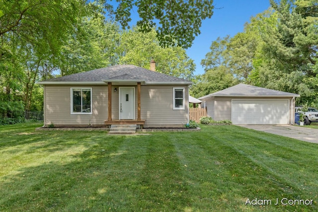 3655 Giddings Ave SE, Grand Rapids, MI 49508 - view of front facade with a chimney and a detached garage