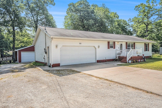 50 S Bock Rd, Muskegon, MI 49442 - ranch-style home featuring concrete driveway and an attached garage