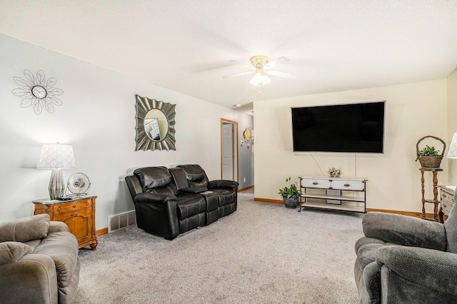 50 S Bock Rd, Muskegon, MI 49442 - carpeted living area featuring a ceiling fan and baseboards