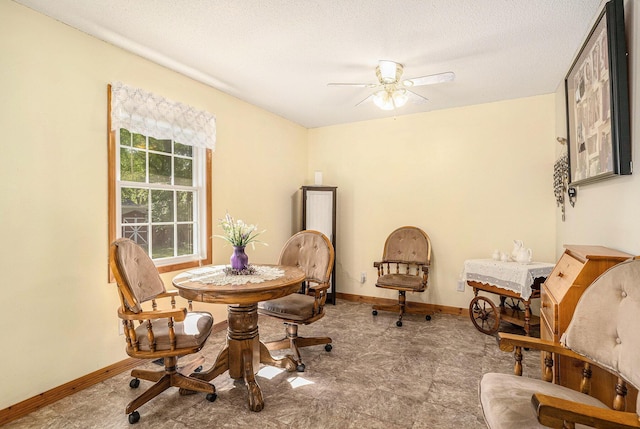 50 S Bock Rd, Muskegon, MI 49442 - dining room featuring ceiling fan and baseboards