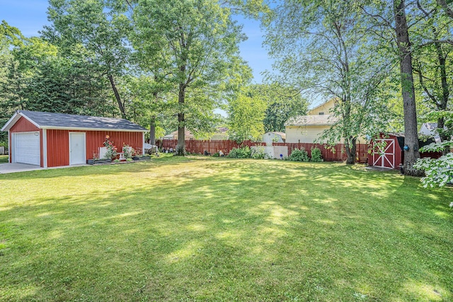 50 S Bock Rd, Muskegon, MI 49442 - view of yard with a detached garage and a shed