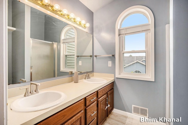 2492 Sunny Creek St SE, Kentwood, MI 49508 - full bath featuring double vanity and an enclosed shower
