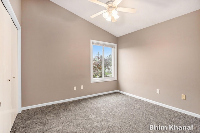2492 Sunny Creek St SE, Kentwood, MI 49508 - carpeted empty room featuring vaulted ceiling and ceiling fan