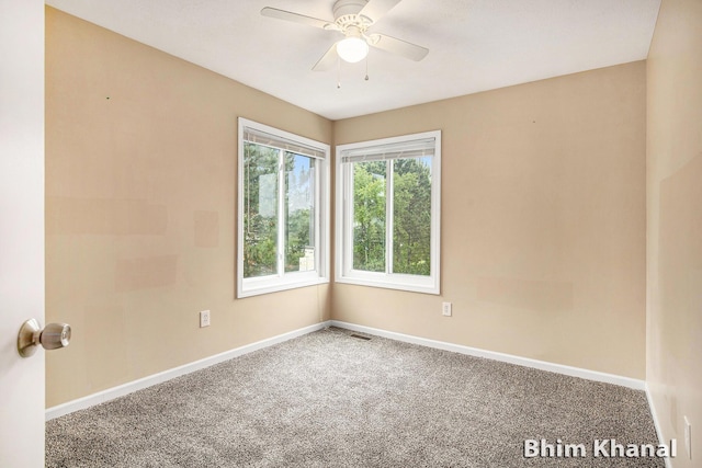 2492 Sunny Creek St SE, Kentwood, MI 49508 - carpeted empty room featuring baseboards and a ceiling fan