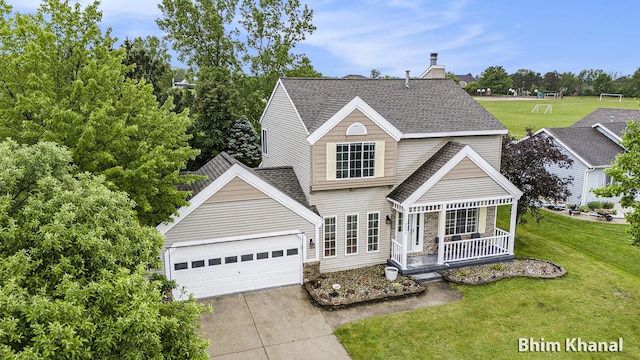 2492 Sunny Creek St SE, Kentwood, MI 49508 - traditional-style house with a porch, concrete driveway, a garage, a front lawn, and a shingled roof
