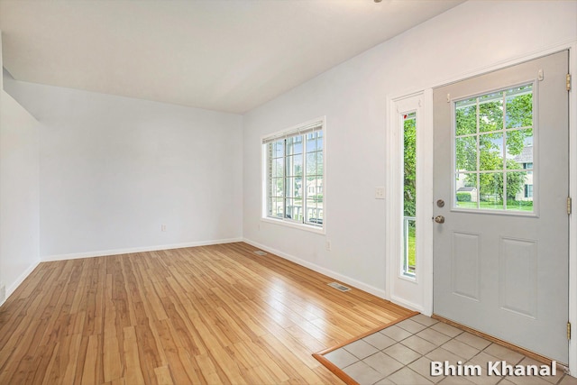 2492 Sunny Creek St SE, Kentwood, MI 49508 - foyer with light wood-style flooring and baseboards