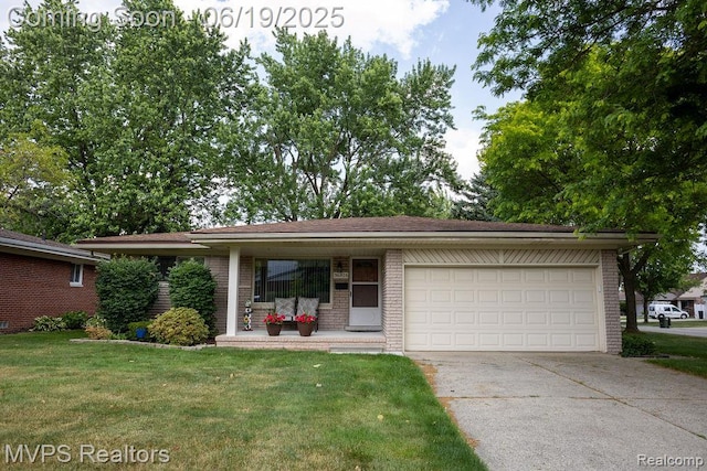 36816 Pepper Ct, Sterling Heights, MI 48312 - single story home featuring brick siding, driveway, a garage, a front yard, and a porch