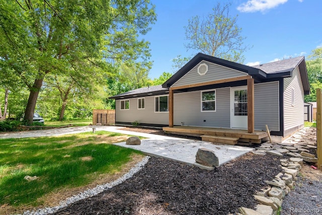 3166 Highland Blvd, Highland, MI 48356 - back of property featuring roof with shingles