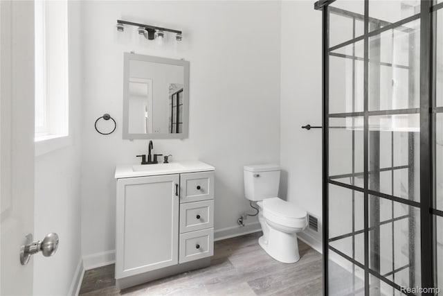 3166 Highland Blvd, Highland, MI 48356 - bathroom featuring vanity and wood finished floors