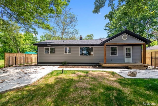 3166 Highland Blvd, Highland, MI 48356 - back of house with covered porch