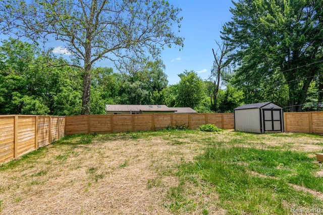 3166 Highland Blvd, Highland, MI 48356 - fenced backyard featuring a storage shed