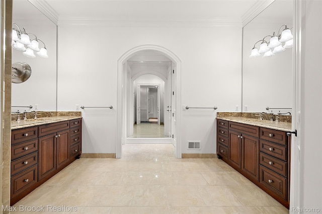222 Arlington St, Birmingham, MI 48009 - full bathroom with ornamental molding and two vanities