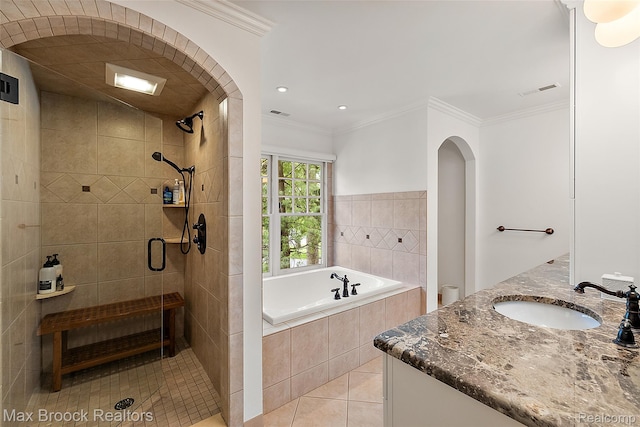 222 Arlington St, Birmingham, MI 48009 - full bath with a bath, vanity, a stall shower, tile patterned floors, and crown molding