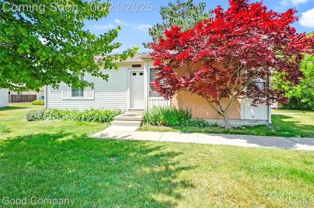 2826 Roundtree Dr, Troy, MI 48083 - view of property hidden behind natural elements with a front yard