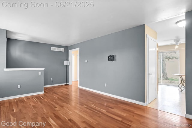 2826 Roundtree Dr, Troy, MI 48083 - unfurnished room featuring wood finished floors and a ceiling fan