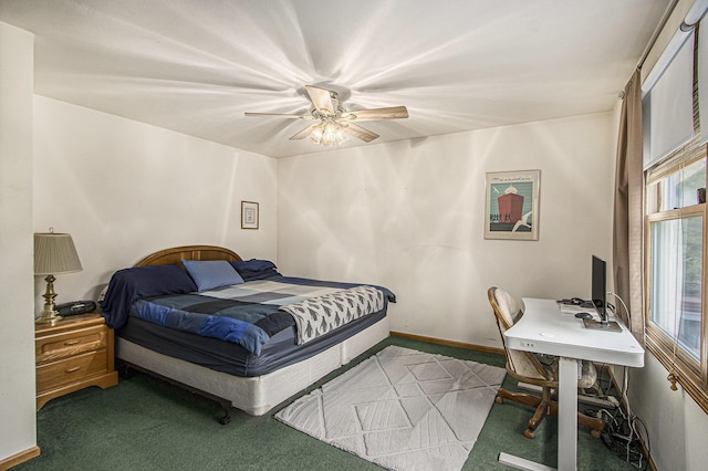 1142 N Peach Ct, Plainwell, MI 49080 - carpeted bedroom with an office area and a ceiling fan