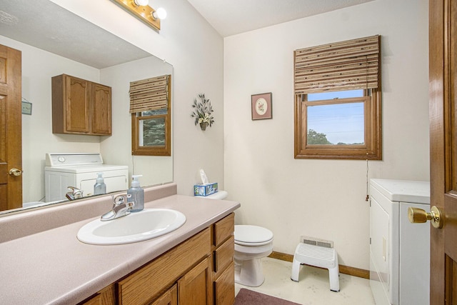 1142 N Peach Ct, Plainwell, MI 49080 - bathroom with washer / dryer and vanity