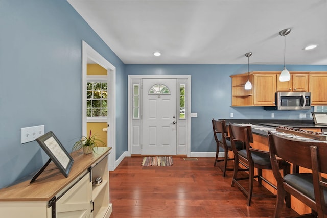 14715 Allman Rd, Concord, MI 49237 - foyer entrance with dark wood-style flooring and recessed lighting