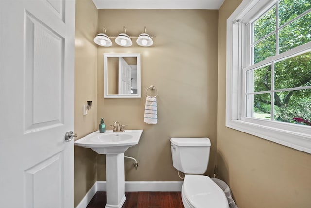 14715 Allman Rd, Concord, MI 49237 - half bathroom featuring baseboards and wood finished floors