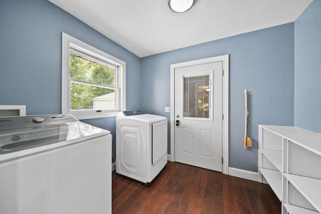 14715 Allman Rd, Concord, MI 49237 - washroom with washing machine and clothes dryer and dark wood finished floors
