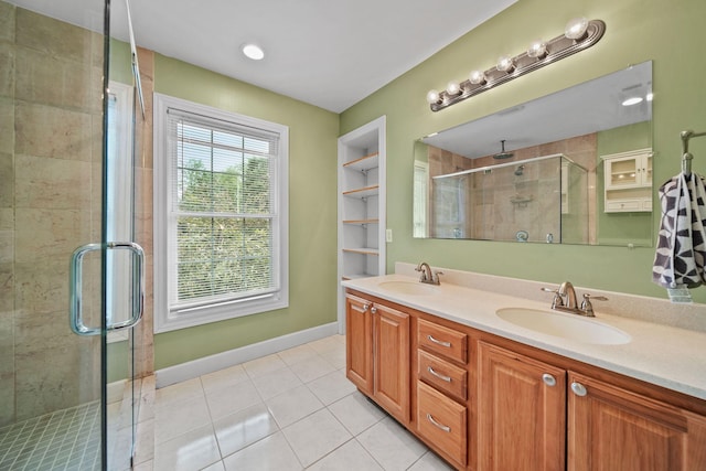 14715 Allman Rd, Concord, MI 49237 - bathroom with double vanity, a stall shower, and tile patterned floors