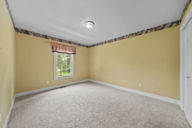 14715 Allman Rd, Concord, MI 49237 - carpeted spare room with baseboards