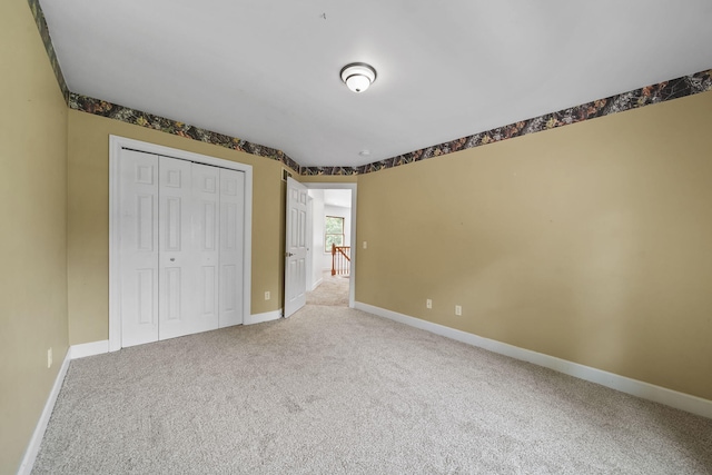 14715 Allman Rd, Concord, MI 49237 - unfurnished bedroom featuring carpet and a closet