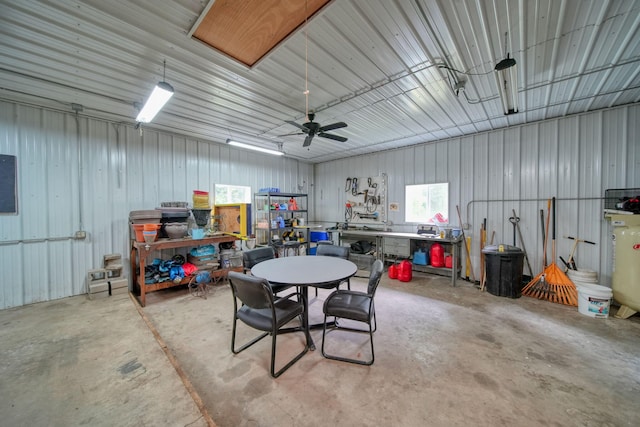 14715 Allman Rd, Concord, MI 49237 - garage with a workshop area and metal wall
