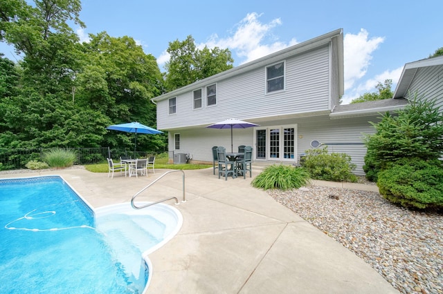 14715 Allman Rd, Concord, MI 49237 - view of pool featuring a patio, outdoor dining space, and french doors