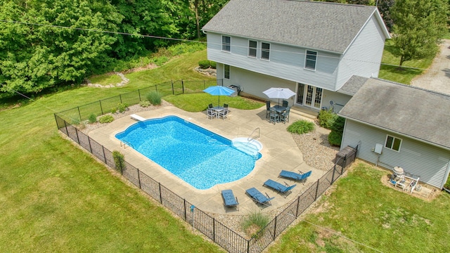14715 Allman Rd, Concord, MI 49237 - view of swimming pool with french doors, outdoor dining space, a patio area, and a fenced backyard