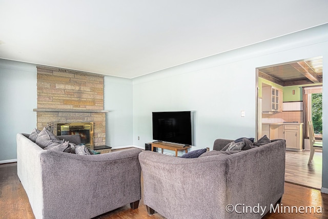 3343 Gateshead St NE, Rockford, MI 49341 - living room with wood finished floors and a stone fireplace