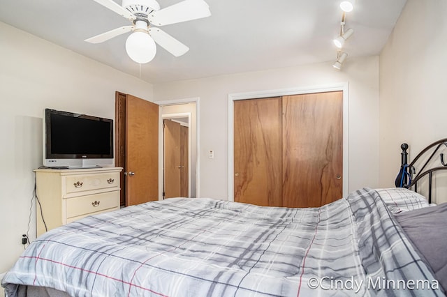 3343 Gateshead St NE, Rockford, MI 49341 - bedroom featuring a closet, ceiling fan, and track lighting