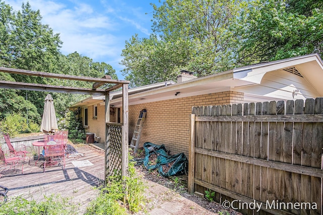3343 Gateshead St NE, Rockford, MI 49341 - view of patio / terrace with a wooden deck and outdoor dining area