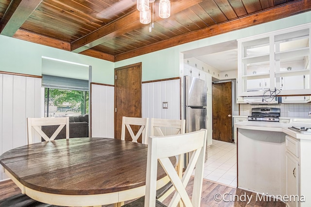 3343 Gateshead St NE, Rockford, MI 49341 - dining space with a wood ceiling with exposed beams