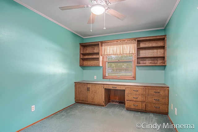 3343 Gateshead St NE, Rockford, MI 49341 - unfurnished office with built in desk, light colored carpet, a ceiling fan, and crown molding