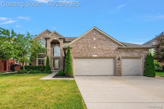 18852 Newbridge Dr, Macomb, MI 48044 - traditional-style home with driveway, an attached garage, brick siding, and a front lawn