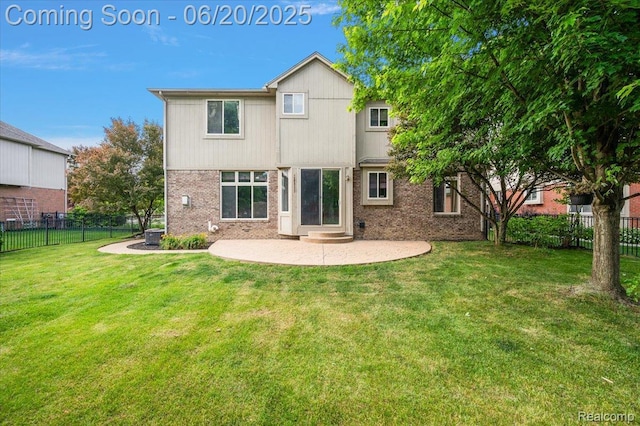 18852 Newbridge Dr, Macomb, MI 48044 - rear view of property with a patio area and brick siding