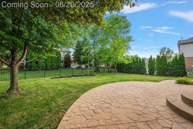 18852 Newbridge Dr, Macomb, MI 48044 - fenced backyard with a patio area