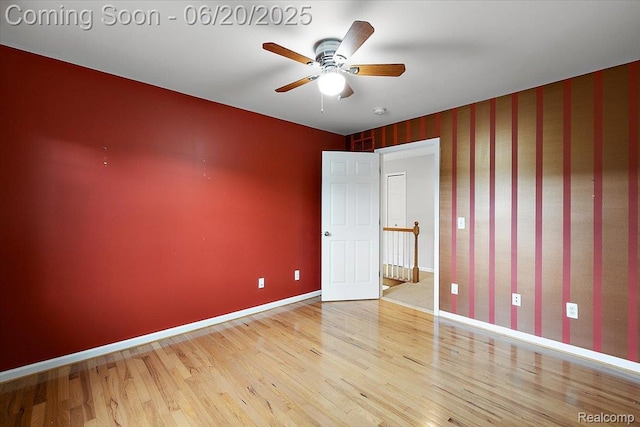 18852 Newbridge Dr, Macomb, MI 48044 - unfurnished bedroom with wood finished floors and baseboards