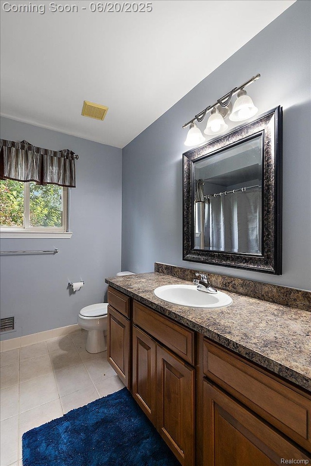 18852 Newbridge Dr, Macomb, MI 48044 - full bathroom with vanity and tile patterned floors
