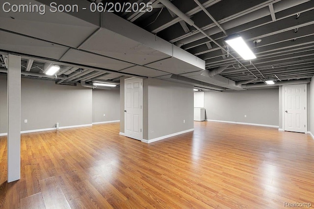 18852 Newbridge Dr, Macomb, MI 48044 - finished basement with wood finished floors