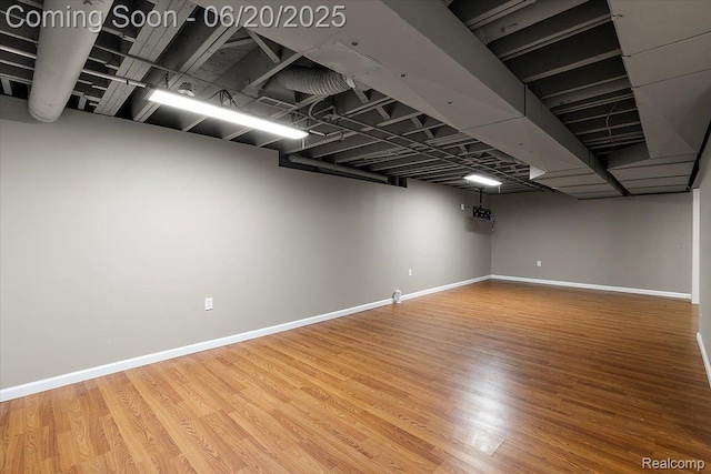 18852 Newbridge Dr, Macomb, MI 48044 - finished below grade area featuring wood finished floors