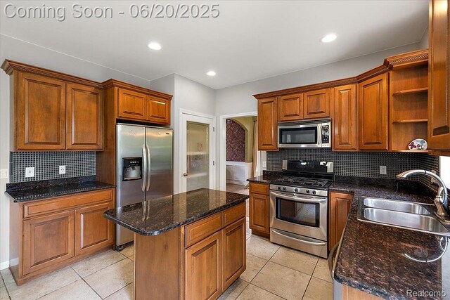 18852 Newbridge Dr, Macomb, MI 48044 - kitchen with appliances with stainless steel finishes, open shelves, light tile patterned floors, a center island, and recessed lighting