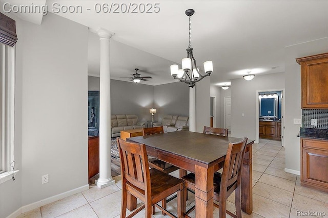 18852 Newbridge Dr, Macomb, MI 48044 - dining space featuring light tile patterned floors, a ceiling fan, and a chandelier