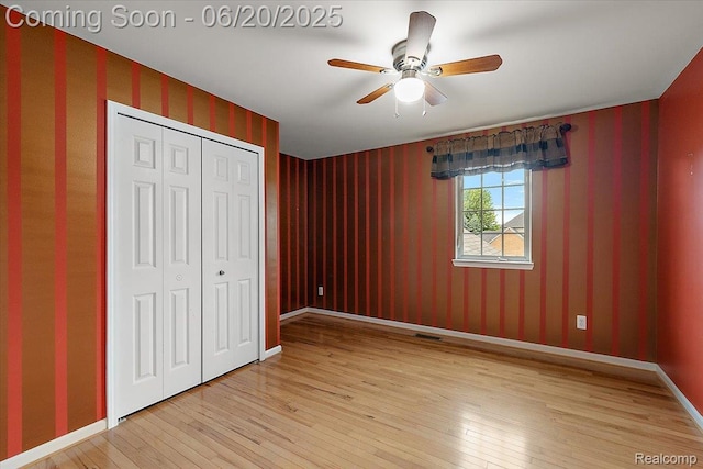 18852 Newbridge Dr, Macomb, MI 48044 - unfurnished bedroom featuring light wood-style floors, a closet, and a ceiling fan