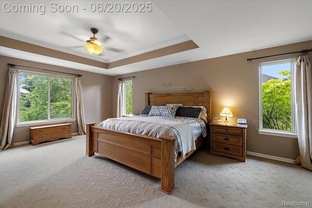 18852 Newbridge Dr, Macomb, MI 48044 - carpeted bedroom featuring a raised ceiling, ornamental molding, and a ceiling fan