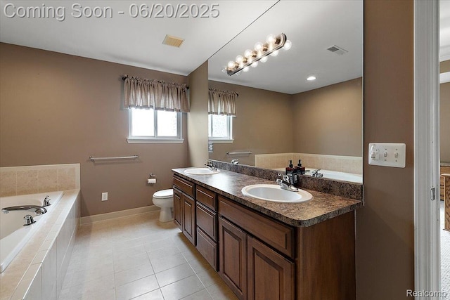 18852 Newbridge Dr, Macomb, MI 48044 - bathroom featuring double vanity, a garden tub, and tile patterned floors
