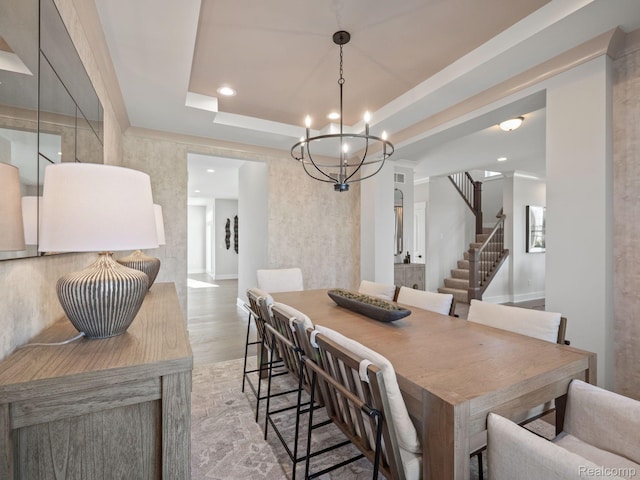 24654 Floret, Macomb, MI 48042 - dining room featuring a chandelier, recessed lighting, stairway, wood finished floors, and a tray ceiling